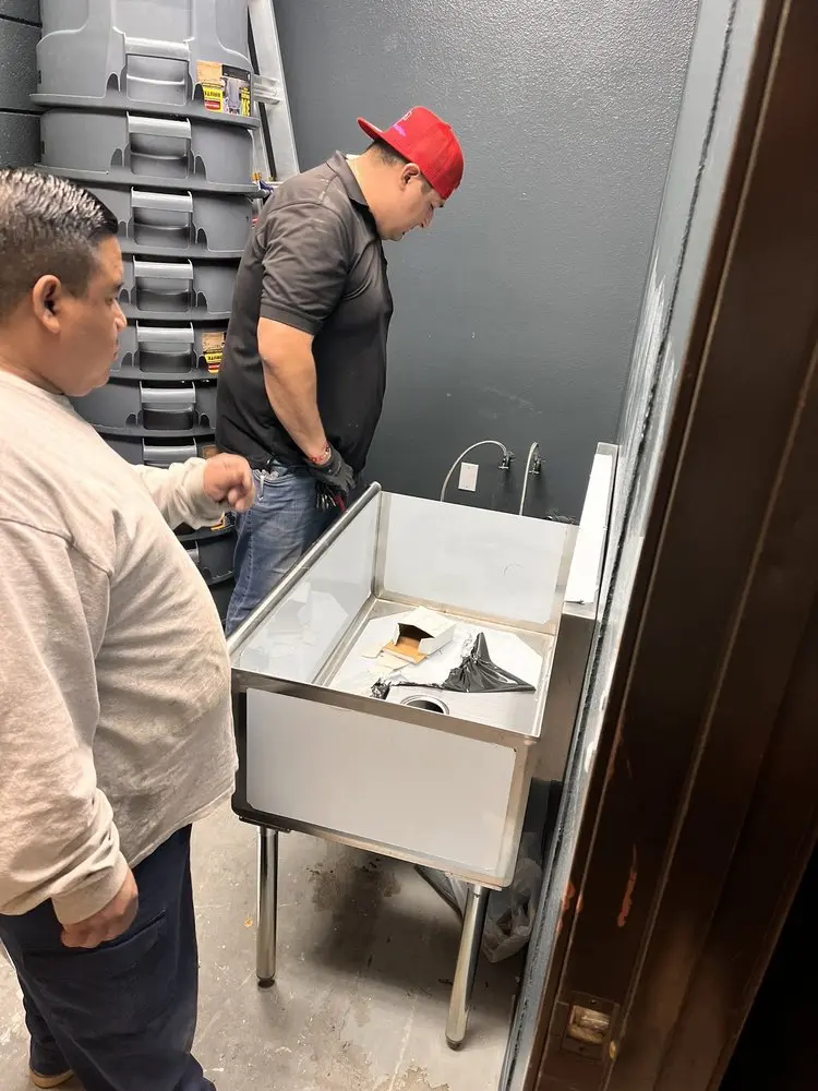 Commercial plumbing and sink installation in Alfred